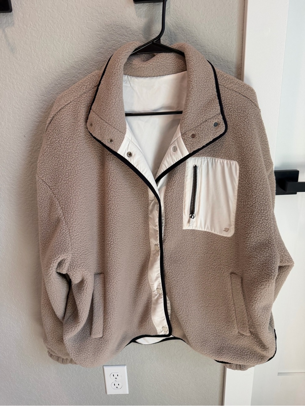 Peloton Taupe Teddy Jacket with White Chest Pocket and Black Trim